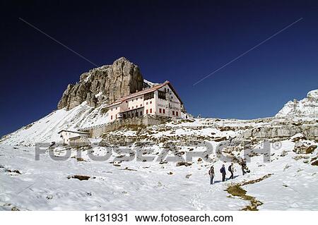 Hikers On Snow Field Approaching Refugio Locatelli Parco Naturale Dolomiti Di Sesto Italian Alps North Of Cortina View Large Photo Image Stock Image - Hikers On Snow Field Approaching Refugio Locatelli Parco Naturale Dolomiti Di Sesto Italian Alps North Of Cortina. Fotosearch