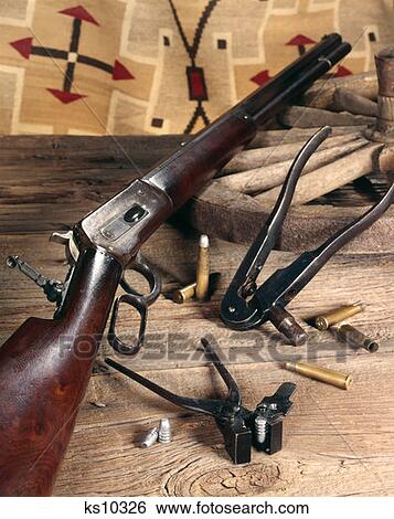 Stock Photograph - Historic Nostalgia Still Life Of 1886 Winchester Rifle. 40-82 Caliber Gun. Fotosearch