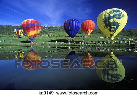 Hot Air Balloons With Water Reflection Snowmass, Colorado View Large Photo Image Stock Photo - Hot Air Balloons With Water Reflection Snowmass, Colorado. Fotosearch