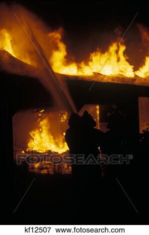 House Fire With Firemen Silhouetted View Large Photo Image Stock Photo - House Fire With Firemen Silhouetted. Fotosearch