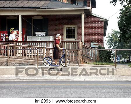 Intercourse Pa Amish Girl Leaving Country Store On Scooter View Large Photo Image Stock Image - Intercourse Pa Amish Girl Leaving Country Store On Scooter . Fotosearch