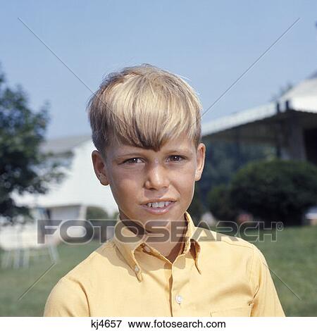 Juvenile Boy Standing Outside Head Shot Dirty Blonde Hair Yellw Shirt Retro View Large Photo Image Stock Photo - Juvenile Boy Standing Outside Head Shot Dirty Blonde Hair Yellw Shirt Retro. Fotosearch