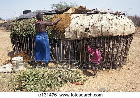 Kenya Samburu Woman Applying Fresh Dung To Roff Of Family Home View Large Photo Image Stock Photograph - Kenya Samburu Woman Applying Fresh Dung To Roff Of Family Home. Fotosearch
