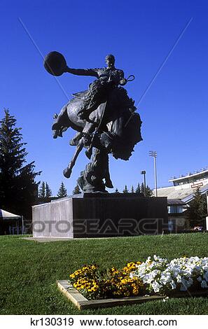 Laramie Wyoming Bucking Horse And Rider Statue War Memorial Stadium University Of Wyoming View Large Photo Image Stock Photo - Laramie Wyoming Bucking Horse And Rider Statue War Memorial Stadium University Of Wyoming . Fotosearch
