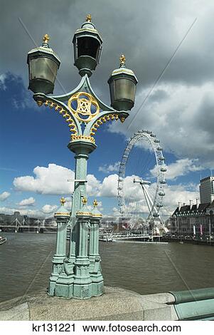 Stock Image - London Eye Lamp Post London, England. Fotosearch