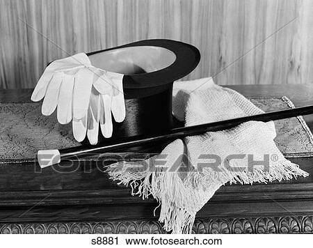 Magician'S Hat Gloves And Magic Wand On Table Indoor View Large Photo Image Stock Image - Magician'S Hat Gloves And Magic Wand On Table Indoor . Fotosearch