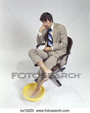 Man Business Suit Sore Feet Resting Worker Tired 1970 1970S Retro View Large Photo Image Stock Photography - Man Business Suit Sore Feet Resting Worker Tired 1970 1970S Retro. Fotosearch