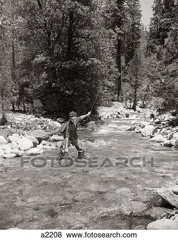 Man Fly Fishing In Stream View Large Photo Image Stock Photo - Man Fly Fishing In Stream. Fotosearch