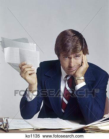 Man Office Working Business Paperwork Overwhelmed Overwhelming Work 1970 1970S Retro View Large Photo Image Stock Photography - Man Office Working Business Paperwork Overwhelmed Overwhelming Work 1970 1970S Retro. Fotosearch