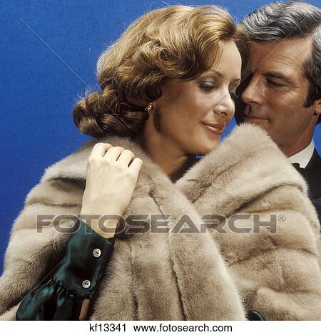 Man Woman Fur Fashion Intimate Embrace 1970 1970S View Large Photo Image Stock Image - Man Woman Fur Fashion Intimate Embrace 1970 1970S . Fotosearch