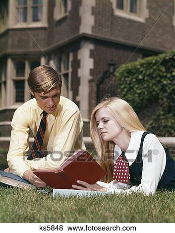 Man & Woman Reading Outdoor View Large Photo Image Stock Photo - Man & Woman Reading Outdoor . Fotosearch