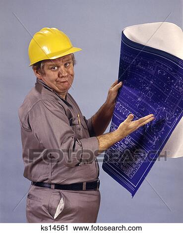 Man Worker Construction Hard Hat Blueprints Confusion Confused 1970 1970S Retro View Large Photo Image Stock Image - Man Worker Construction Hard Hat Blueprints Confusion Confused 1970 1970S Retro. Fotosearch