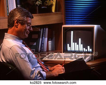 Stock Photography - Man Working With Computer 1980 1980S 1990 1990S . Fotosearch