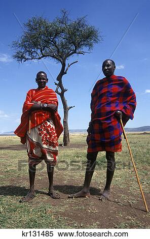 Stock Photography - Masai Mara, Kenya Masai Men Under Acacia Tree. Fotosearch