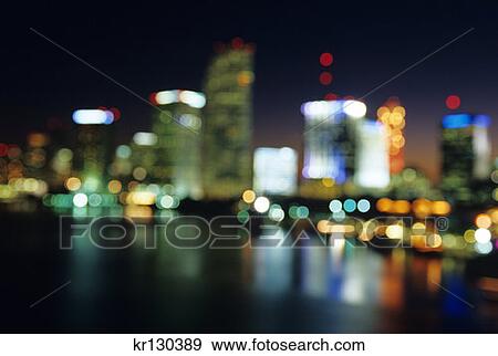 Stock Photo - Miami Florida Downtown Skyline At Night Blurred Focus . Fotosearch