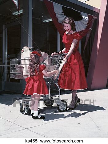 Stock Photography - Mother & Daughter Outside Supermarket. Fotosearch