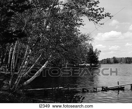 Narrow Wooden Dock Jutting Into Serene Lake Retro View Large Photo Image Stock Photo - Narrow Wooden Dock Jutting Into Serene Lake Retro. Fotosearch