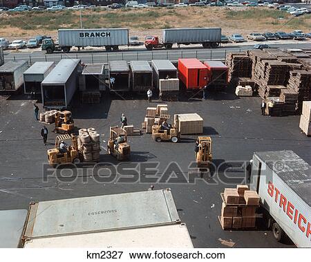 New Jersey Port Authority Shipping Trucks Being Loading View Large Photo Image Stock Photo - New Jersey Port Authority Shipping Trucks Being Loading. Fotosearch