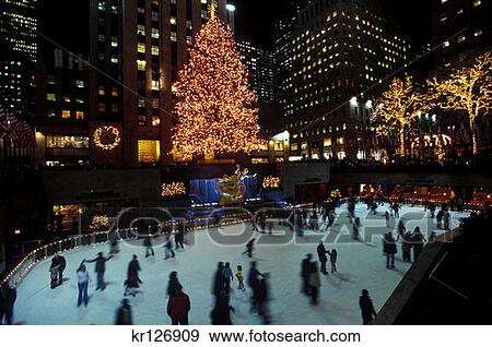 New York New York People Ice Skating In Rockefeller Center At Christmas Time View Large Photo Image Stock Photo - New York New York People Ice Skating In Rockefeller Center At Christmas Time . Fotosearch