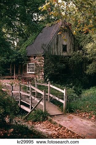Nicholson Street Williamsburg Virginia Neglected Log Cabin Wooden Footbridge View Large Photo Image Stock Photography - Nicholson Street Williamsburg Virginia Neglected Log Cabin Wooden Footbridge. Fotosearch
