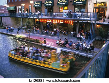Stock Image - Oklahoma City, Ok Restaurants In Bricktown Entertainment District At Dusk. Fotosearch