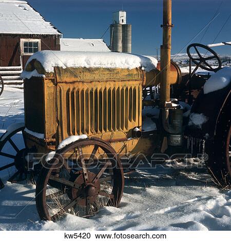 Old Mccormick Deering Tractor Sitting In The Snow View Large Photo Image Stock Image - Old Mccormick Deering Tractor Sitting In The Snow. Fotosearch
