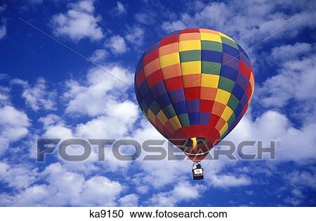 One Hot Air Balloon With White Clouds Snowmass, Colorado View Large Photo Image Stock Image - One Hot Air Balloon With White Clouds Snowmass, Colorado. Fotosearch
