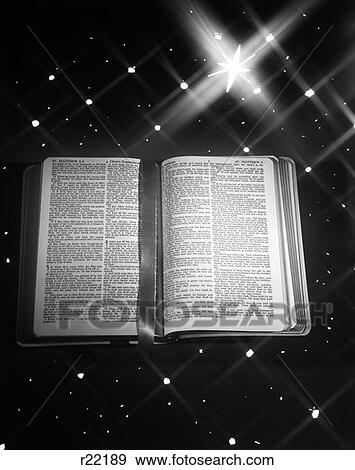 Open Book Bible Ribbon Bookmark Matthew Against Star Background Large Star Of Bethlehem Christmas View Large Photo Image Stock Photo - Open Book Bible Ribbon Bookmark Matthew Against Star Background Large Star Of Bethlehem Christmas . Fotosearch