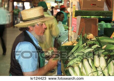Philadelphia Pa Reading Terminal Market Amish Farmer Selling Corn View Large Photo Image Stock Image - Philadelphia Pa Reading Terminal Market Amish Farmer Selling Corn . Fotosearch