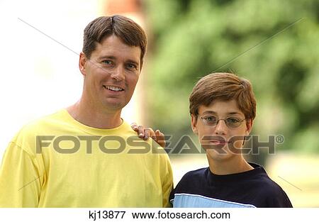 Stock Photo - Portrait Of Father And Son. Fotosearch