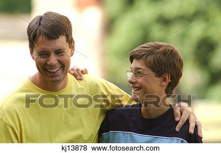 Stock Photo - Portrait Of Father And Son. Fotosearch