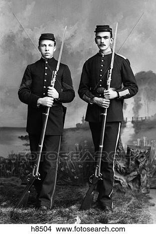 Picture - Portrait Of Two Union Soldiers Standing Holding Bayonets . Fotosearch
