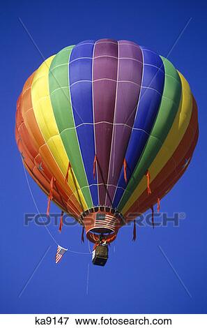 Rainbow Colored Hot Air Balloon With American Flag Snowmass, Colorado View Large Photo Image Stock Photo - Rainbow Colored Hot Air Balloon With American Flag Snowmass, Colorado. Fotosearch