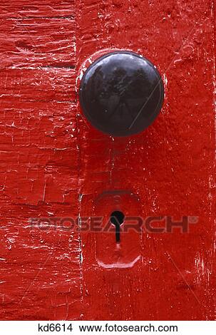Picture - Red Door And Knob Close Up . Fotosearch