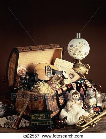 Retro Hope Chest Dowry Doll Ukele Lamp Memorabilia Camera Periscope Blaket Afghan Fan Trumpet Tea Kettle View Large Photo Image Stock Photo - Retro Hope Chest Dowry Doll Ukele Lamp Memorabilia Camera Periscope Blaket Afghan Fan Trumpet Tea Kettle. Fotosearch