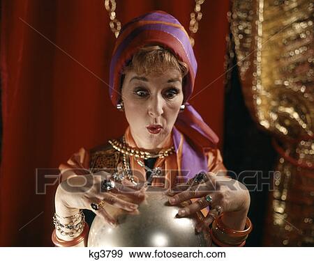 Retro Woman Dressed As Fortune Teller Costume Jewelry Rings Crystal Ball View Large Photo Image Stock Photo - Retro Woman Dressed As Fortune Teller Costume Jewelry Rings Crystal Ball. Fotosearch