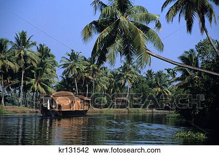 Stock Image - Rice Boat Converted To House Boat Alappuzha Kerala State India . Fotosearch