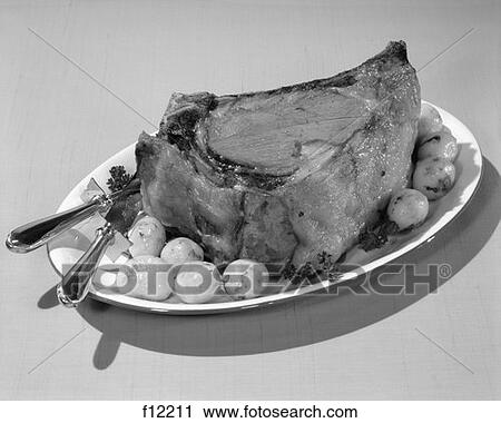 Roast Beef With Oven Browned Potatoes Retro View Large Photo Image Stock Image - Roast Beef With Oven Browned Potatoes Retro. Fotosearch
