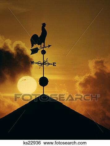 Rooster Weather Vane Silhouetted Against Sunrise Sunset View Large Photo Image Stock Photograph - Rooster Weather Vane Silhouetted Against Sunrise Sunset . Fotosearch