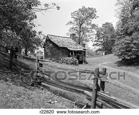 Rustic Log Cabin From 1880s Behind Post Rail Fence In Blue Ridge