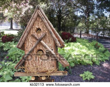 Rustic Style Birdhouse Made From Log And Twigs View Large Photo Image Stock Image - Rustic Style Birdhouse Made From Log And Twigs . Fotosearch
