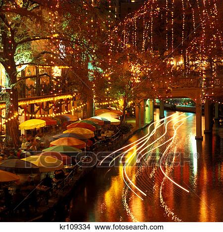 Picture - San Antonio Tx Christmas Lights And Outdoor Cafe Along Riverwalk Paeo De Rio . Fotosearch