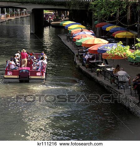 Stock Photograph - San Antonio Tx Riverboat Outdoor Restaurant Riverwalk Paseo Del Rio . Fotosearch