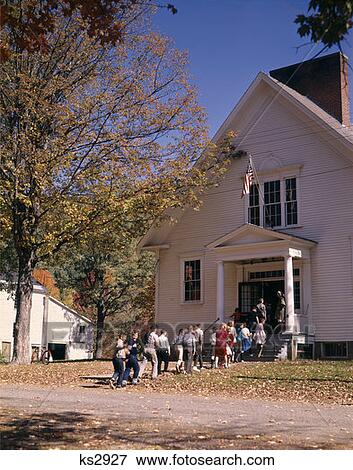 Stock Photo - School Children Walking Into Schoolhouse 1970 1970S. Fotosearch