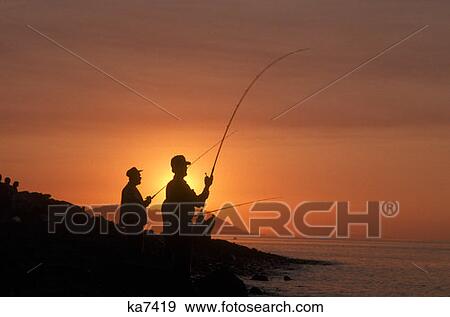 Silhouette Of Men Surf Fishing View Large Photo Image Stock Photo - Silhouette Of Men Surf Fishing. Fotosearch