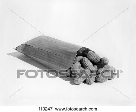 Small Brown Paper Bag Wtih Peanuts Spill Out Of Top Shells Snack View Large Photo Image Stock Photo - Small Brown Paper Bag Wtih Peanuts Spill Out Of Top Shells Snack . Fotosearch