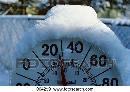 Snow On Outdoor Thermometer Cold 28 Degrees Freezing Temperature View Large Photo Image Stock Photo - Snow On Outdoor Thermometer Cold 28 Degrees Freezing Temperature . Fotosearch