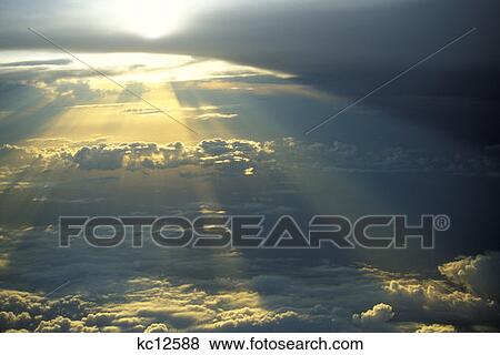 Stratocumulus Clouds With Sun Rays At Sunset View Large Photo Image Stock Photo - Stratocumulus Clouds With Sun Rays At Sunset . Fotosearch