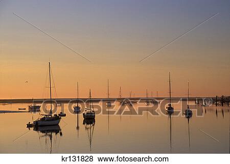 Stock Photo - Sunrise Anchored Boats Salt Run Lighthouse Park St Augustine . Fotosearch