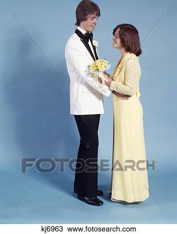 Teen Couple Boy Girl Standing Facing One Another 1970S View Large Photo Image Stock Image - Teen Couple Boy Girl Standing Facing One Another 1970S. Fotosearch